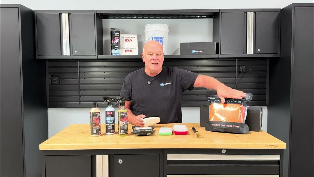 Picture of Prentice St Clair with his hand placed above an Autofiber drying towel for his video titled Interior Car Detailing Essentials - Tools & Products Every DIYer Needs